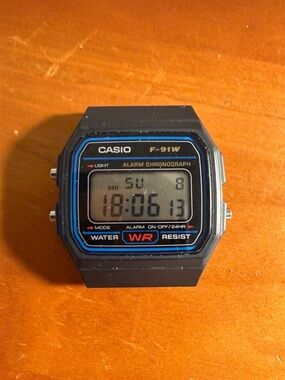 Casio F-91W Black Digital Watch with Blue Trim